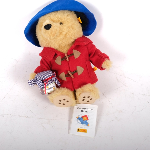 128 - STEIFF - a Steiff Paddington Bear with associated tag and original box, ref. 354700