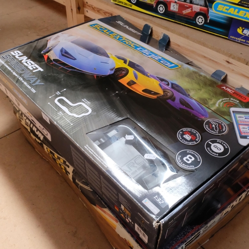 134 - SCALEXTRIC - a group of 3 boxed sets, including Pole Position Reve Up, Burn Off!, appears complete w... 