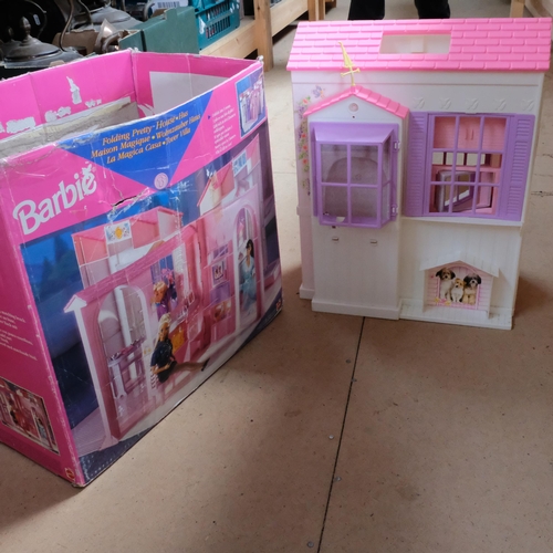 136 - BARBIE - a boxed Barbie folding pretty house, in original box with some associated accessories