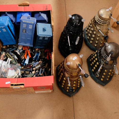 137 - DR WHO - a large quantity of Dr Who figurines, and associated Tardis Police boxes, including a group... 