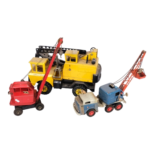 99 - A Vintage Tonka crane, a red Tri-ang crane ref. Jones KL44, a 1973 Ideal Toy Corporation Mighty Mo t... 