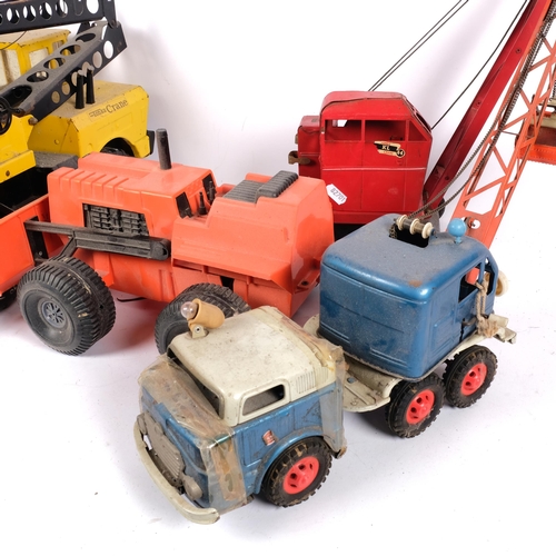 99 - A Vintage Tonka crane, a red Tri-ang crane ref. Jones KL44, a 1973 Ideal Toy Corporation Mighty Mo t... 