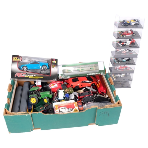 149 - A group of boxed and loosed diecast vehicles and other toys and accessories, including various 00 ga... 