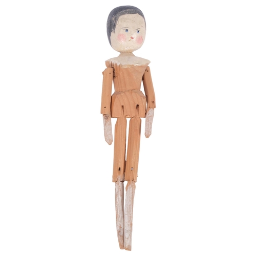 152 - A carved and painted wood-jointed peg doll, L29cm