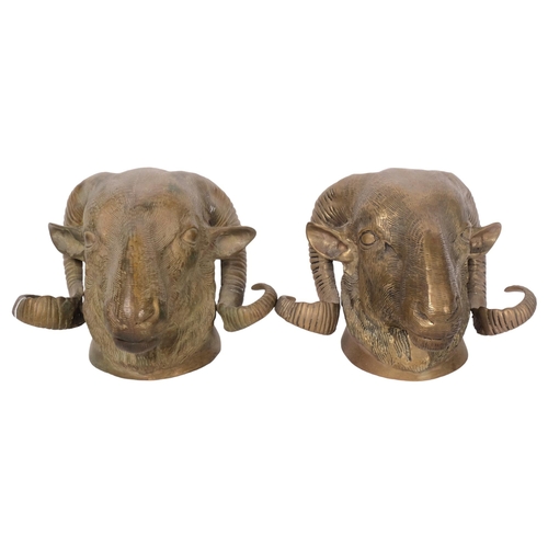 158 - A pair of cast-bronze ram's head wall sconces, W18.5cm