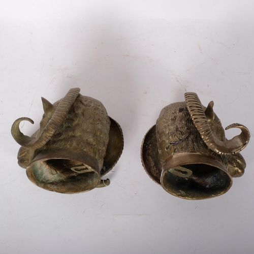 158 - A pair of cast-bronze ram's head wall sconces, W18.5cm