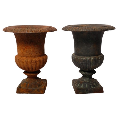 168 - A pair of small cast-iron Campana design urns, W18cm, H23cm