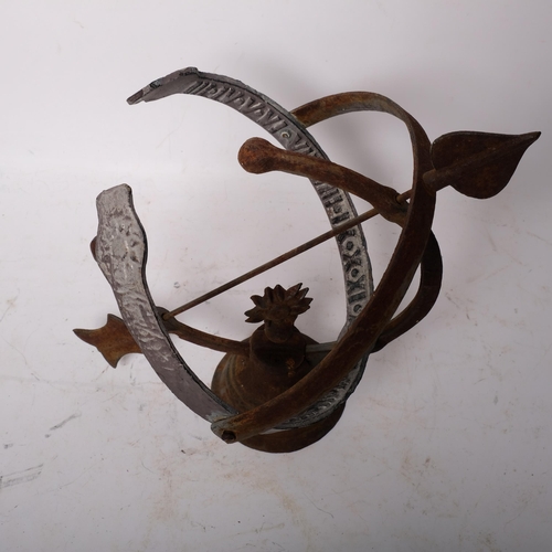 169 - A small weathered armillary sphere, on bell-shaped stand, H31cm