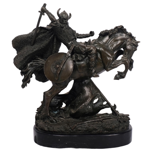 175 - A patinated bronze sculpture depicting a Viking warrior on horseback, mounted on black marble base, ... 