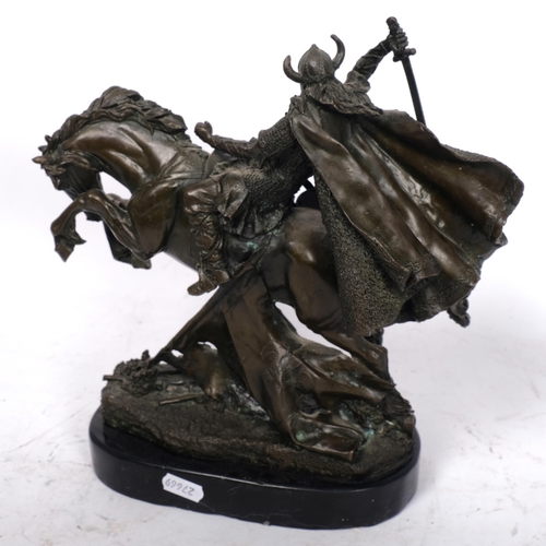 175 - A patinated bronze sculpture depicting a Viking warrior on horseback, mounted on black marble base, ... 