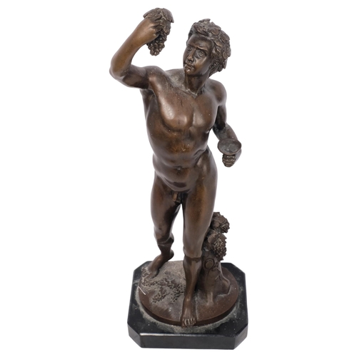 180 - A patinated bronze sculpture of Dionysus, on black marble plinth base, overall height 57cm