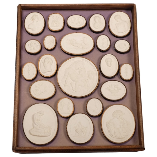 183 - A 3-tier pine case containing 67 Grand Tour plaster intaglios, each tier W23cm, H28cm, with lid