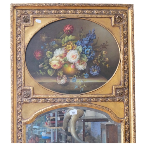 186 - A composite gilded pier glass mirror, with a still life panel to the top, 141 x 65cm