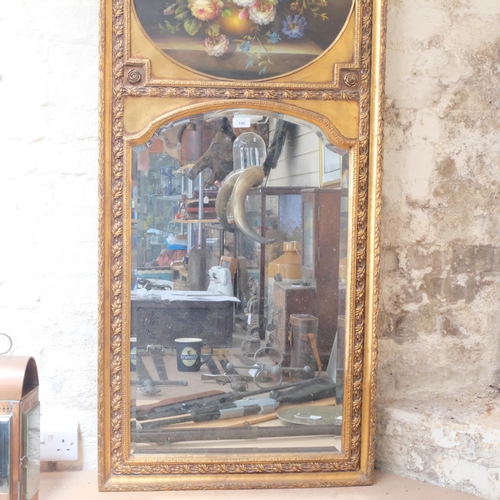 186 - A composite gilded pier glass mirror, with a still life panel to the top, 141 x 65cm