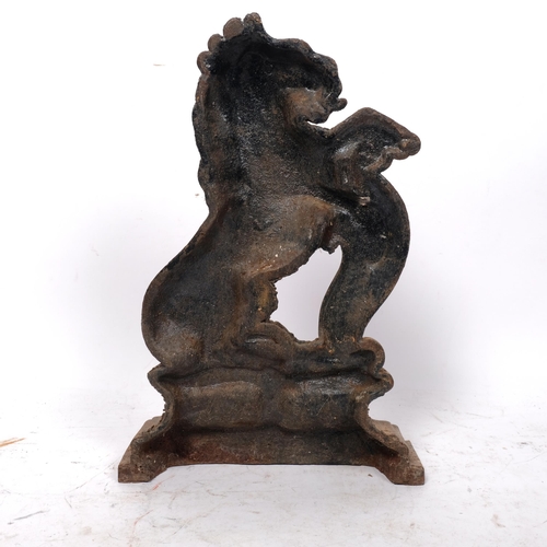 201 - A cast-iron Heraldic rampant lion doorstop, H38cm