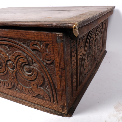 204 - An 18th century oak Bible box, relief carved decoration, 63 x 23 x 48cm