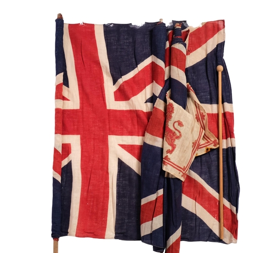 211 - A group of 3 Union Jacks, mounted on hand-held rods, 80 x 58cm approx, and a small British Standard ... 