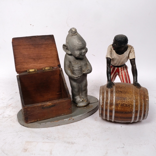 215 - An early 20th century painted wood Chairman Tobacco imp, H23cm, and a Vintage Lemon Hart rum-back ba... 