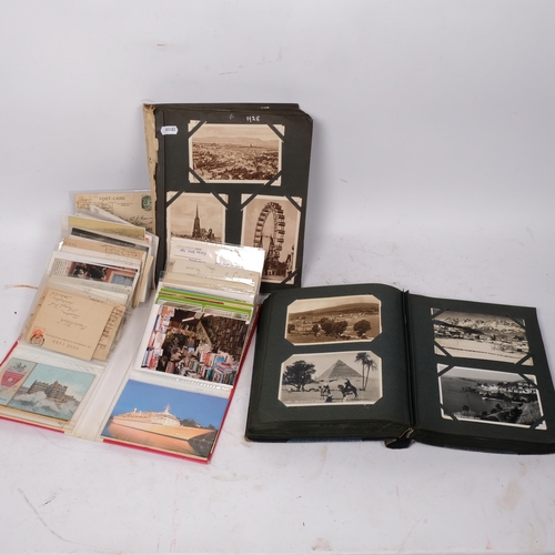 231 - 2 albums of early 20th century postcards, mainly topographical, but also including Cairo, Malaga, Ca... 