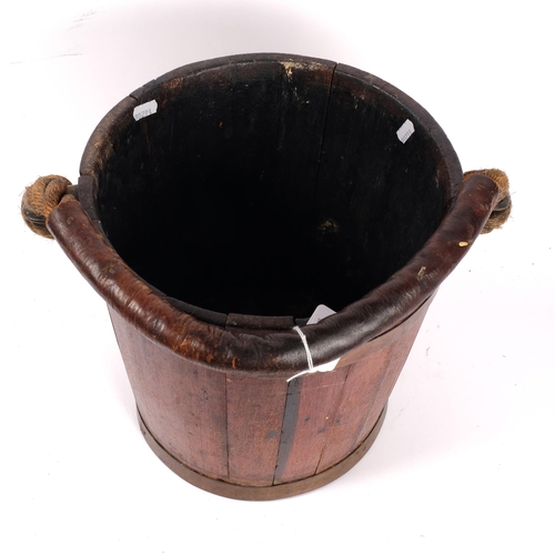 250 - A 19th century Naval fire bucket with leather-clad rope twist handle, H31cm