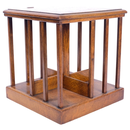 251 - An apprentice piece oak table-top revolving bookcase, H28.5cm, W26cm