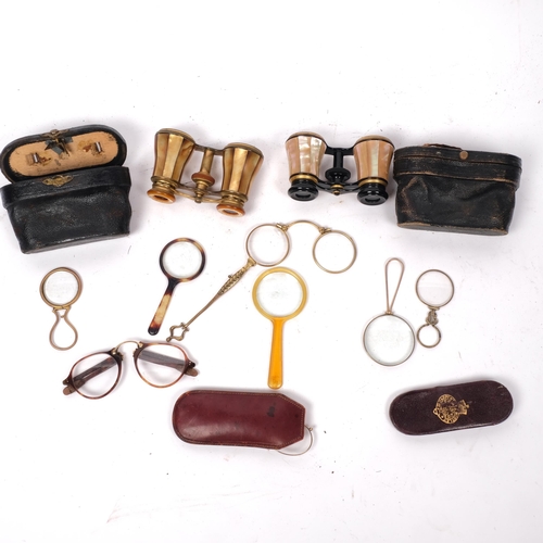 274 - A pair of French gilt-metal opera glasses, cased, and another pair, magnifying glasses, pince nez et... 