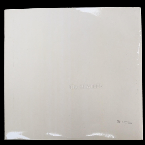 389 - THE BEATLES - White double Album, PMC 7067-8, including photographs of the band members, and fold-ou... 