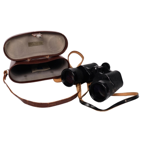 446 - A pair of Carl Zeiss Jenna 10x50 binoculars, marked DDR to the left of the eyepiece, with original c... 