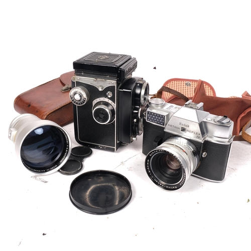 459 - A Yashica 635 medium format TLR camera, serial no. 3890399, and a Kodak Retina Reflex IV, with assoc... 