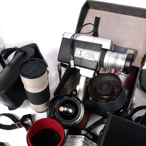 460 - A group of Sigma lenses, in associated protective cases or boxes, including Sigma APO zoom lens, ser... 