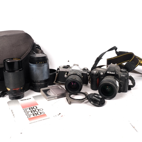 462 - A Nikon F80 camera with associated lens, and instruction manual, a Pentax ME Super camera, serial no... 