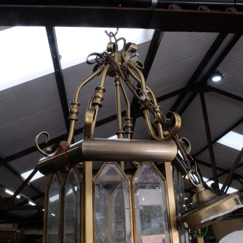 467 - A modern brass and glazed hanging lantern, drop approx 120cm