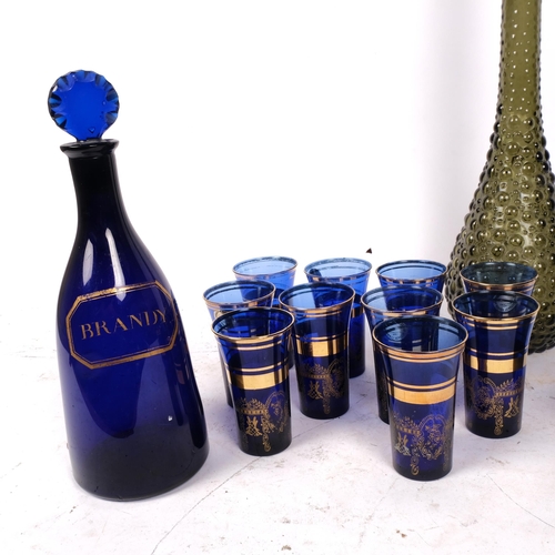 472 - A Bristol blue Brandy decanter and stopper, H28.5cm, a set of 8 Venetian glasses, a Retro decanter a... 