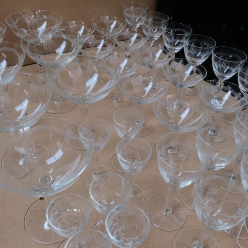 477 - A suite of 44 1930s Art Deco glasses, including liqueurs, Champagne glasses, Port and Sherry, with e... 