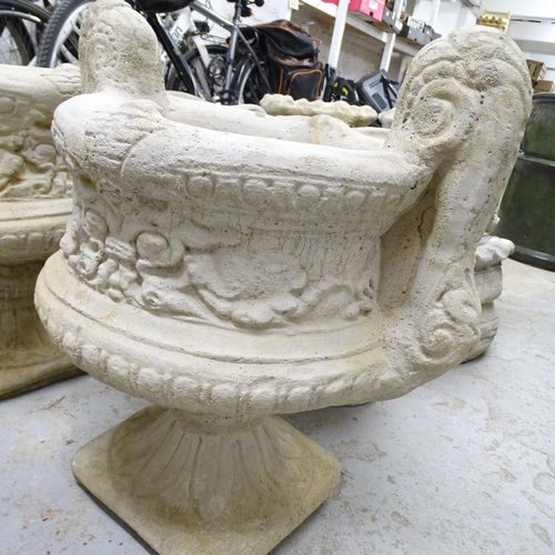 2697 - A pair of modern concrete two-section garden urns, 50x53x36cm, and pair of concrete planter/umbrella... 