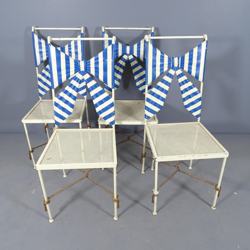 2701 - A set of four painted metal chairs, with bow back decoration and cushions.