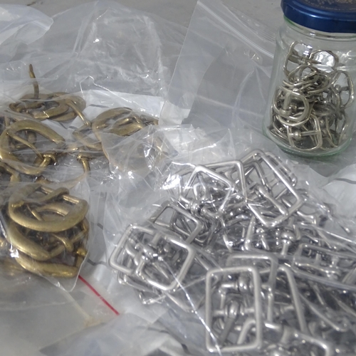 2730 - An assortment of brass and stainless steel buckles including roller and 121 buckles.
From the worksh... 