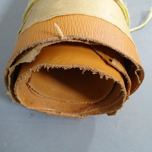 2735 - A roll containing two hides of Sedgewick's 3mm Bag Hide and plain leather in tan.
From the workshop ... 