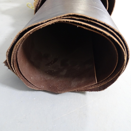 2737 - A roll containing two hides of Sedgewick's 3mm Bag Hide and Plain leather in dark brown.
From the wo... 