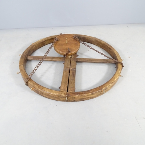 2757 - An oak circular hanging pan rack. Diameter 104cm.