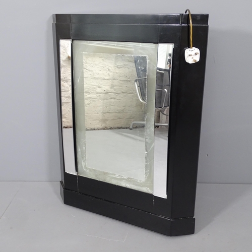 2043 - A 1930s Art Deco ebonised illuminated dressing mirror. 68x87x8cm.