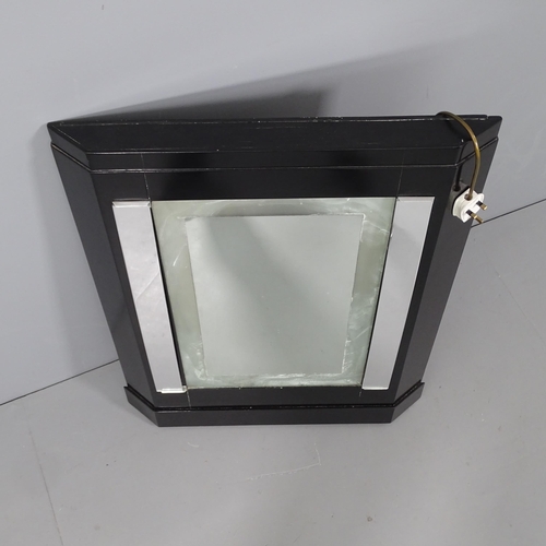 2043 - A 1930s Art Deco ebonised illuminated dressing mirror. 68x87x8cm.