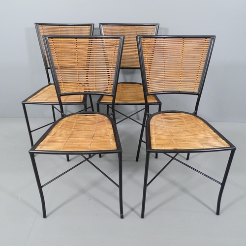 2044 - A set of four mid-century design chairs in black painted metal and bamboo.