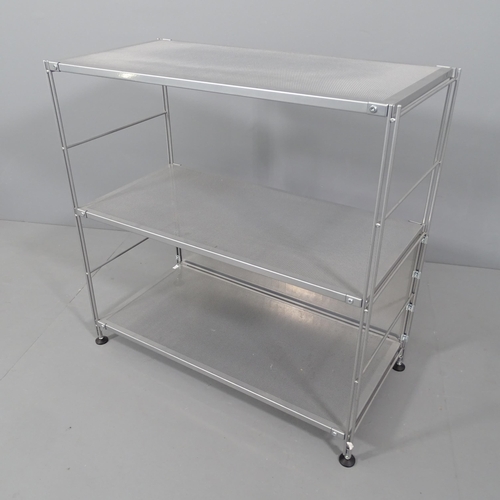 2047 - A contemporary designer three-tier shelving unit with perforated metal shelves on chrome steel base.... 