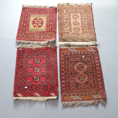 2313 - Four various Afghan and Persian mats. Largest 70x50cm.