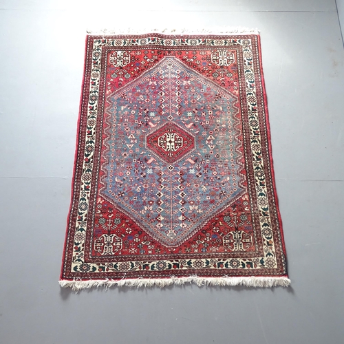 2316 - A red-ground Persian Bijar rug. 153x106cm.