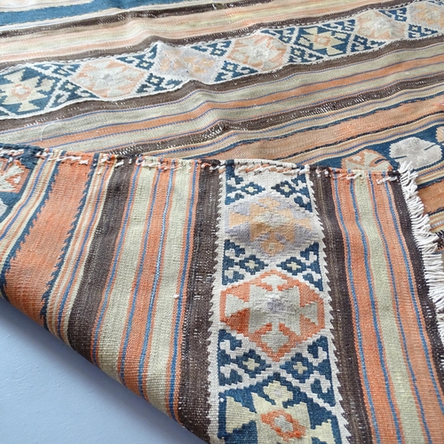 2323 - A Moroccan Kilim rug. 200x130cm.