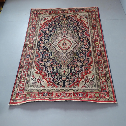 2328 - A cream ground Persian Hamadan rug. 204x133cm