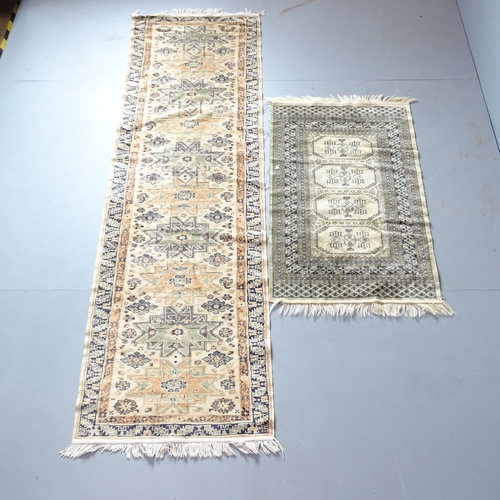 2331 - A silk runner, 234x70cm, and another silk rug (2).