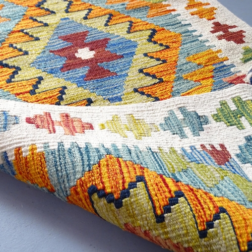 2334 - A Chobi Kilim runner. 210x64cm.